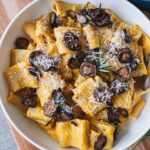 Butternut Squash and Roasted Garlic Pasta topped with Crispy Mushrooms